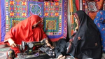 Vocational center in which 2 girls are doing the stitching of clothes