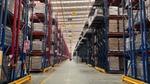 A customer warehouse with products packaged on shelves