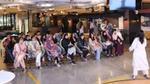 Fatima having a session with a group of children.