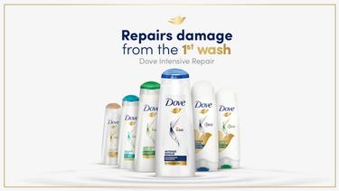 A collection of Dove hair products and a text that reads “Repairs damage from the 1st wash. Dove intensive repair”.